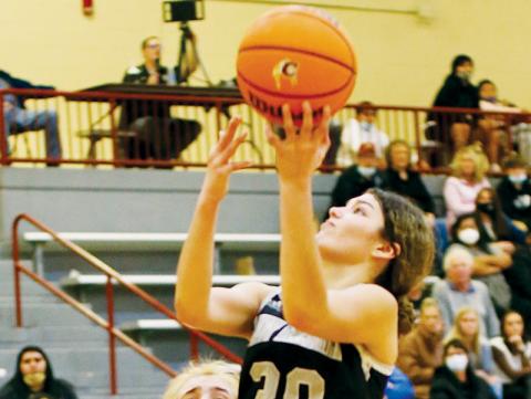 Lady Knights senior Yeika Jimenez drives past Cherokee’s Erin Rogers for a second-half basket on Jan. 13. Photo by Miranda Buchanan/Robbinsville High School Yearbook
