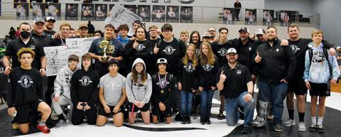Members of the Robbinsville High School wrestling team gather at center mat Saturday to celebrate its 2022 James Orr Invitational victory. Photos by Kevin Hensley/sports@grahamstar.com