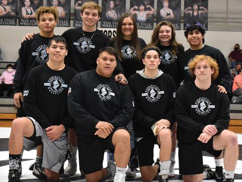 Prior to Tuesday’s dual against Cherokee, Robbinsville wrestling recognized its nine seniors. All names are listed from left. Kneeling: Ben Wachacha, Carlos Wesley, Zane Lucksavage and Jacob Hall. Standing: Jayden Nowell, Kyle Fink, manager Ivy Odom, Aynsley Fink and Jaret Panama. Photo by Kevin Hensley/sports@grahamstar.com