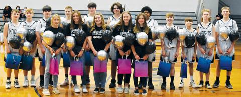 Prior to Monday’s game, Robbinsville Middle School recognized the 8th-grade members of its basketball program. All names are listed from left. Front row: Anna Williams, Katie Lyn Gross, Lady Knights manager Jernie Greene, Maleah Cox and Abby Wehr. Back row: Luke Lovin, Dane Knott, Isiac Collins, Tillman Adams, Owen Blevins, Dane Daniels, Kyzik Teesateskie, Benny Moose, Tyler Patton, Javian Blair and Kasen Buchanan. Photo by Kevin Hensley/sports@grahamstar.com