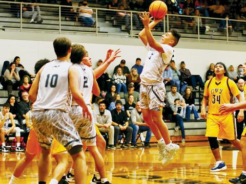 Xander Wachacha takes center stage during Feb. 3's home victory over Cherokee. Photo by Miranda Buchanan/Robbinsville High School Yearbook