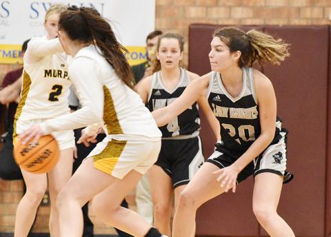 Robbinsville senior Yeika Jimenez guards Murphy's Addie Johnson during Friday's Smoky Mountain Conference Tournament finals at Swain County High School. Photo by Kevin Hensley/sports@grahamstar.com