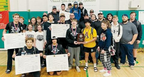 Members of the Robbinsville High School wrestling program gather with the 1A Western Regional Individual Runner-Up plaque, at the conclusion of the two-day tournament at Alleghany. Photos by Susan Crowe/Contributing Photographer
