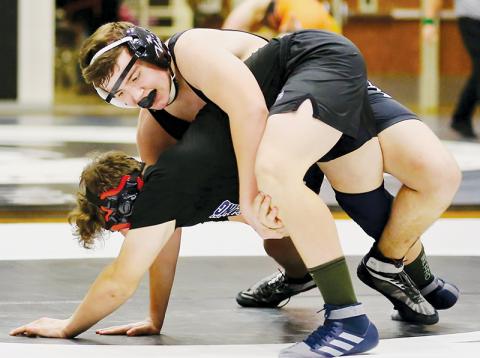 Robbinsville’s Murphy Shanahan wrangles his opponent to the mat during Monday’s first-round postseason dual against Langtree Charter Academy. Photo by Miranda Buchanan/Robbinsville High School Yearbook