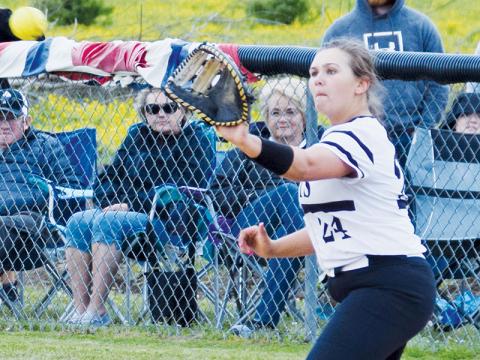 Robbinsville’s Ivy Odom reaches for the catch  during the first round of the state playoffs against South Stokes on May 5. Odom is one of eight Lady Knights returning for their senior season.