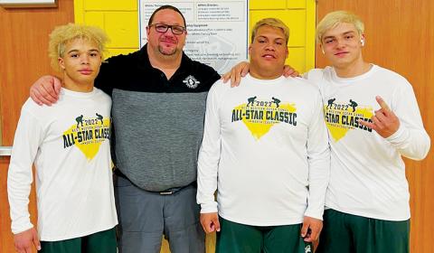 Members of “The ‘Ville” were selected for the N.C./S.C. All-Star Classic, which was held Friday in Myrtle Beach. From left are Jayden Nowell, Robbinsville head coach Todd Odom, Carlos Wesley and Kyle Fink. Photo by Susan Crowe/Contributing Photographer