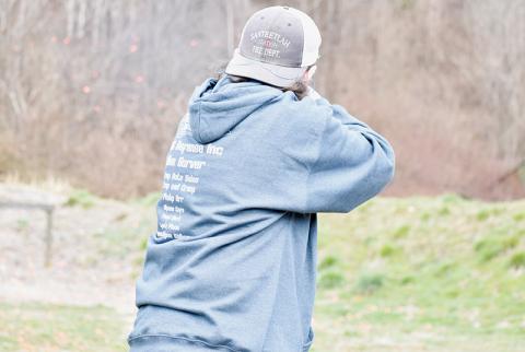 Robbinsville High’s Cyler Orr disintegrates a clay target during the trap competition at Saturday’s FarWest Tournament in Marble. Photo by Kevin Hensley/sports@grahamstar.com