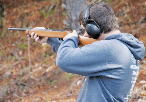 Robbinsville’s Will Crisp competes in the rifle competition at Saturday’s District 9 Tournament. Photo courtesy of Cheri Lynn/Robbinsville Shooting Team