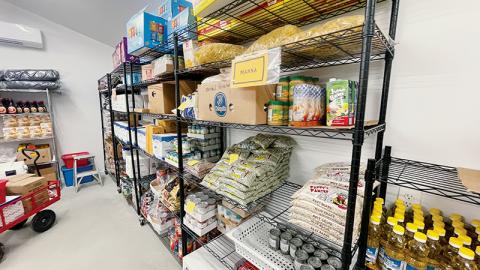 Shelves are stocked with food at Grace Place’s new pantry, which opened in February. Photos by Randy Foster/news@grahamstar.com