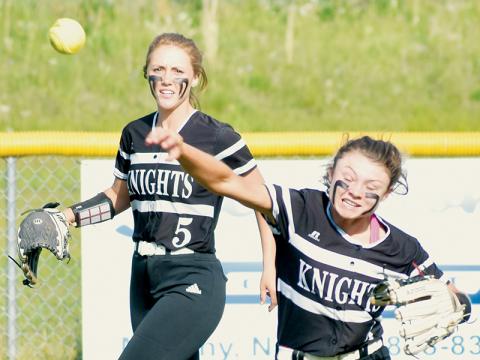 With Halee Anderson backing her up, senior Aynsley Fink fires in a throw from right-center field Monday at Hiwassee Dam. Photos by Kevin Hensley/sports@grahamstar.com