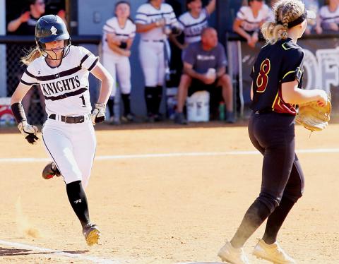 Senior Brook Turpin (left) beats out a play at first during Tuesday’s loss to South Stokes. Photo courtesy of Miranda Buchanan/Robbinsville High School Yearbook
