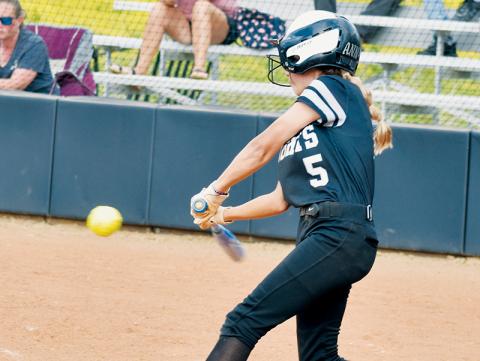Middle school Lady Knight Anna Williams prepares to drive the ball May 3 against Hiwassee Dam/Ranger. Williams unleashed a 3-run homer Friday, aiding Robbinsville immensely in a 20-6 drubbing of the previously-unbeaten Cherokee Lady Braves. Photo by Kevin Hensley/sports@grahamstar.com