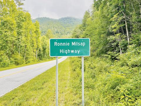 Two signs identifying Ronnie Milsap Highway were installed on U.S. Hwy. 129, one near Yellow Creek Road (pictured here) and the other near Meadow Branch Road, not far from the community where Milsap spent some of his childhood. Photo by Randy Foster/news@grahamstar.c