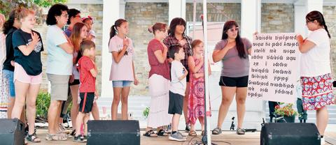 Cherokee Language Summer Course students recite the Pledge of Allegiance Saturday at the Graham County Heritage Festival. Photos by Kevin Hensley/editor@grahamstar.com