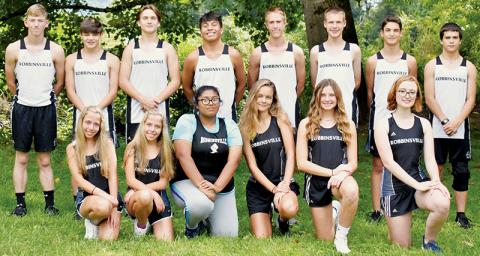 The 2022 Robbinsville varsity cross country team. Names are listed from left in both rows. Front: Skyler Oliver, Kamree Oliver, Jennifer Guzman, Liberty Hartley, Abby Wehr and Elizabeth Boyle. Back: Ethan Webster, Skyler Anderson, Bruce Helms, Xander Wachacha, William Cable, Zeb Stewart, Albert Avella and Braxton Hicks. Not pictured is head coach Kaitlyn Carringer-Adams. Photo by Kevin Hensley/sports@grahamstar.com