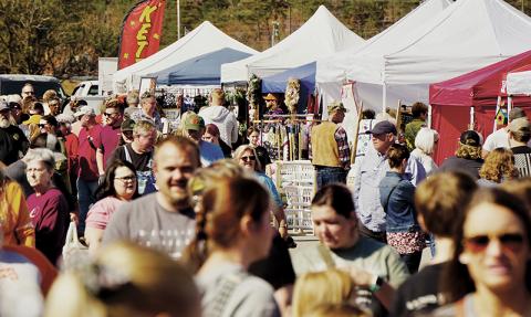 A swarm of attendees mill around Saturday’s Cherohala Skyway Festival. The annual extravaganza is held in Tellico Plains, Tenn., which was connected to Robbinsville with the skyway’s opening in 1996. Photos by Randy Foster/news@grahamstar.com