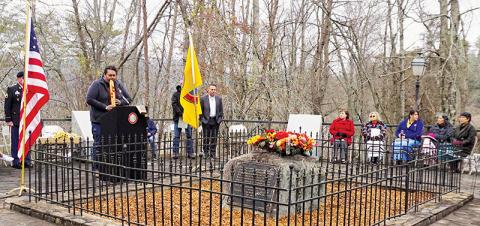 Jarrett Wildcatt performs on flute during a wreath-laying ceremony at the Junaluska Memorial and Burial Site in Robbinsvillle on Nov. 16. Photos by Randy Foster/news@grahamstar.com
