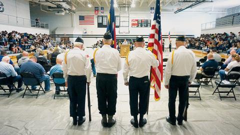 Veterans of Foreign Wars Post 8636 and American Legion Post 192 provide a color guard at Robbinsville High School’s Veterans Day ceremony Nov. 10. Photo by Randy Foster/news@grahamstar.com