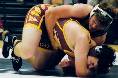 Kage Williams maintains top control over Cherokee’s Vincent Owle during a Nov. 15 dual. A two-time state  champion, Williams won the 195-pound bracket at Saturday’s Dekota Smith Invitational. Photo by Kevin Hensley/sports@grahamstar.com