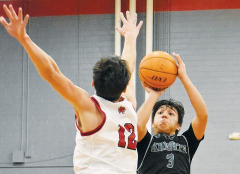 Xander Wachacha – shown unloading a second-half 3 on Dec. 20 at Andrews – had a team-high 21 points in Robbinsville’s loss to Smoky Mountain on Tuesday. Photo by Kevin Hensley/sports@grahamstar.com
