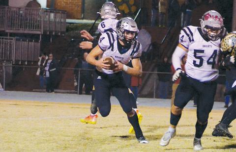 Cuttler Adams examines the Eastern Randolph defense in the third round of the 1A playoffs on Nov. 18. Adams was recently afforded the distinction of Co-Smoky Mountain Conference Back of the Year. Photo by Kevin Hensley/sports@grahamstar.com