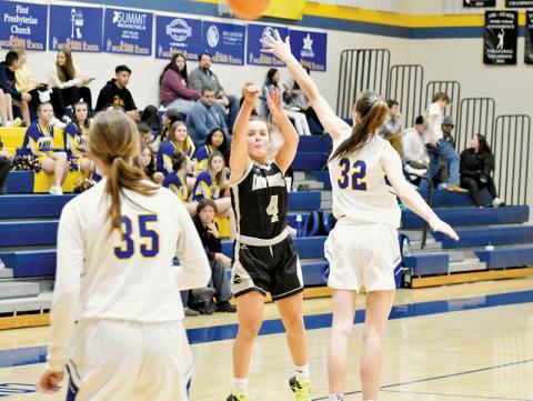 Robbinsville senior Desta Trammell launches an outside shot Monday at Highlands. Trammell hit a pair of 3-pointers in the Lady Knights’ loss to the Lady Highlanders. Photo by Kevin Hensley/sports@grahamstar.com