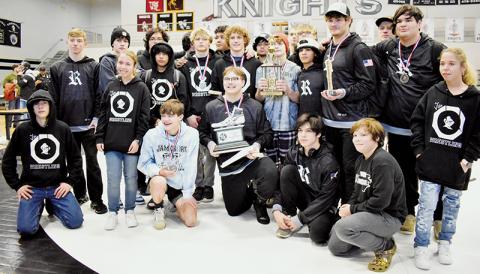 Members of the Robbinsville wrestling program gather with the 2023 James Orr Memorial  Invitational runner-up trophy, clinched after hosting their signature tournament Saturday. Photo by Kevin Hensley/sports@grahamstar.com