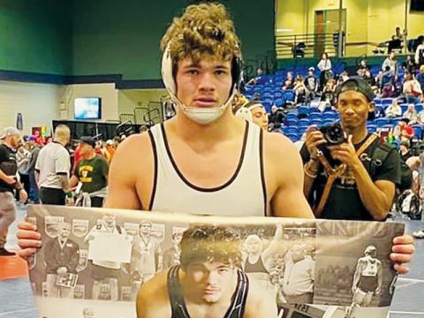 Robbinsville junior Kage Williams picked up his 100th career win on Dec. 29 during the Holy Angels Invitational in Greensboro.