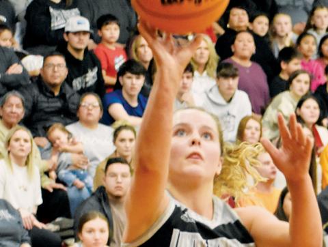 Lady Knights senior Desta Trammell shoves the ball toward the net on a breakaway in Friday’s Smoky Mountain Conference Tournament finals. Kevin Hensley/sports@grahamstar.com