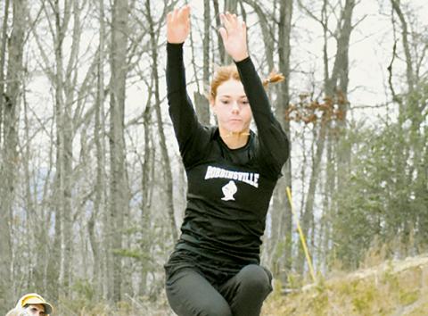 Lady Knights junior Zoie Shuler takes flight during an indoor track meet at Swain County on Jan. 11. Shuler is the favorite to win at least two state championships for Robbinsville this weekend. Photo by Kevin Hensley/sports@grahamstar.com