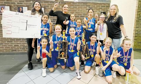 The Snowbird Lady Warriors Termite Girls capped off a perfect 11-0 season by defeating Copper Basin, Tenn., on Saturday in the Smokey Mountain Youth Conference Tournament finals. Photo by Kevin Hensley/sports@grahamstar.com