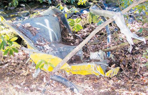 This photo shows wreckage of helicopter that crashed in Joyce Kilmer Forest in 1962, during a spraying operation for the elm-spanworm infestation. Photo courtesy of Jeff Wadley/Civil Air Patrol