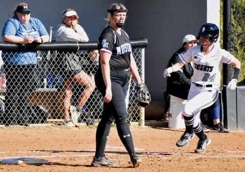 All Smoky Mountain senior Bailey Cloer (8) could do was watch as outfielders madly attempted to field a ball driven to the outer reaches by Lady Knights senior Kensley Phillips. Phillips doubled on the second-inning drive and recorded her Knights-leading fifth triple at Andrews on Tuesday. Photo courtesy of Bentley Riggs/Contributing Photographer