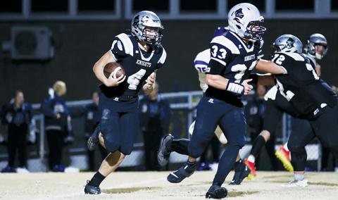 Led by the assurance of fellow classmate Kage Williams (33), Cuttler Adams takes off in the open during the first round of the state playoffs Nov. 3 against Cherryville. Adams has barely pumped the brakes this summer – and the fruits of his labor are already showing. Photos courtesy of Miranda Buchanan/Robbinsville High School Yearbook