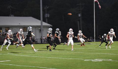 Donovan Carpenter unleashes a pass during the first half of Friday's 26-0 rout over Franklin. Photo by Danielle Crabtree/The Graham Star