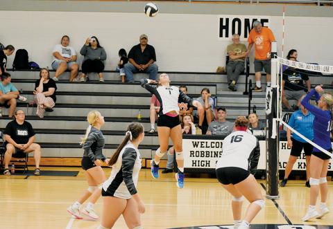 Senior outside hitter Delaney Brooms rises for a spike Monday against Hiwassee Dam. Her kills were too much for the Lady Eagles to handle in the match – especially in the clinching set. Photo by Danielle Crabtree/The Graham Star
