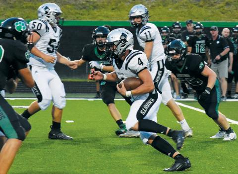Cuttler Adams finds an open hole during Sept. 1’s game at Mountain Heritage.  Adams has recently been selected to play in a pair of prestigous showcases after his high-school career wraps up. Photo by Kevin Hensley/sports@grahamstar.com