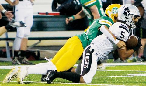 Darion Ledbetter clutches one of his two interceptions Friday at Alleghany – both of which led to touchdowns in Robbinsville’s 35-7 win over the Trojans. Photos courtesy of Stewart Royall/Studio Roxie