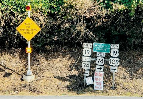 The N.C. Department of Transportation recently activated a warning light to alert drivers approaching the busy U.S. 19/74/129 intersection in Topton. Photo by Kelsey Krizsan/The Graham Star