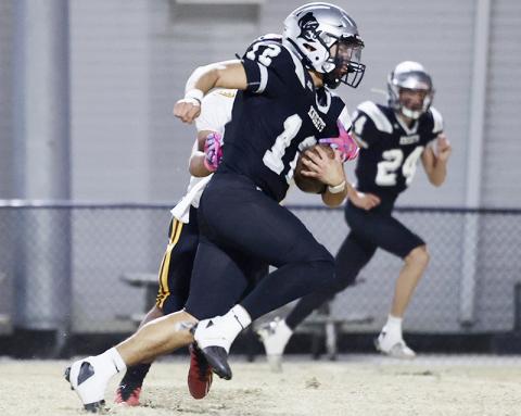 Quinn Jumper is shown rushing for one of his two touchdowns last week against Thomas Jefferson Classical Academy. Jumper did not find the end zone Thursday against Mountain Island Charter – but his defense kept the Raptors rocked throughout Robbinsville's 40-7 triumph in the second round of the state playoffs. Photo courtesy of Miranda Buchanan/Robbinsville High School