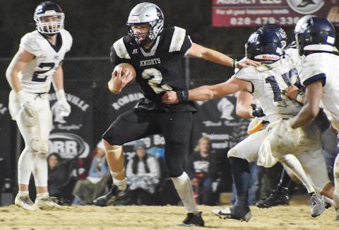 Senior Chase Calhoun (2) shoves away the attempt of Mount Airy’s Ian Gallimore during Friday’s 1A Western Regional Final in Robbinsville. Photo by Fala Welch/The Graham Star