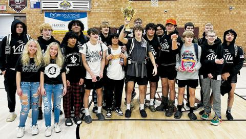 After five grueling matches Saturday, the Robbinsville High School Black Knights proudly display the Pool C, Devil Duals first-place trophy. Photo courtesy of Robbinsville Wrestling