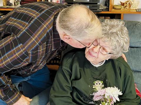 No matter the age, G.D. Phillips and Blaze Powers have already solved one equation: there is never a bad time to give flowers to their respective wives, Woody and Aubrey. Photos by Latresa Phillips/The Graham Star
