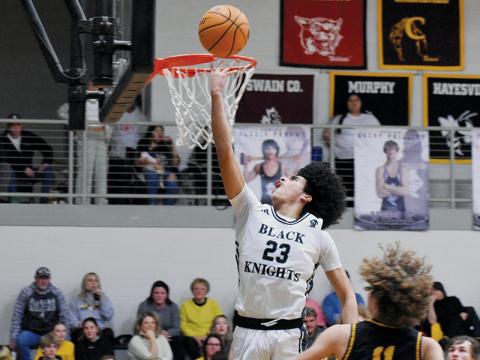 All Murphy’s Ryan Payne (11) could do was look on in awe of Robbinsville junior Darion Ledbetter making this reverse layup look easy during Tuesday’s nightcap with the Bulldogs. Photos by Fala Welch/The Graham Star