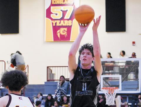 Black Knights senior Donovan Carpenter keys in on a first-half jumper during the regular-season finale Feb. 13 at Cherokee. Photos by Kevin Hensley/sports@grahamstar.com