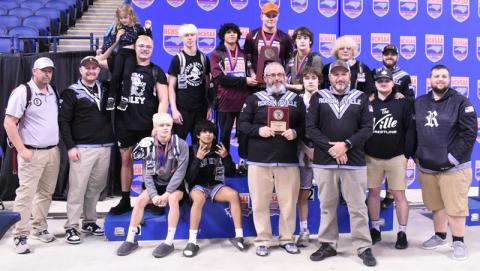 Members of "The 'Ville" bask in the moment of winning the program's inaugural state invitational tournament team title Saturday. Photo by Kevin Hensley/sports@grahamstar.com