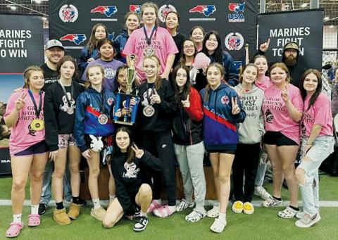 Members of the Robbinsville Middle School Lady Knights celebrate after winning the 42nd Annual North Carolina Junior High State Championship on Saturday. Photos courtesy of Sarah Orr/Lady Knights Wrestling