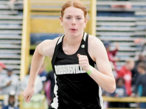 Robbinsville seniors Zoie Shuler and Cuttler Adams – shown competing at last year’s state championship meet – will help usher in the Knights’ 2024 track & field season. As part of their curtain call, both are seeking returns to the 1A dance. Photos by Kevin Hensley/sports@grahamstar.com