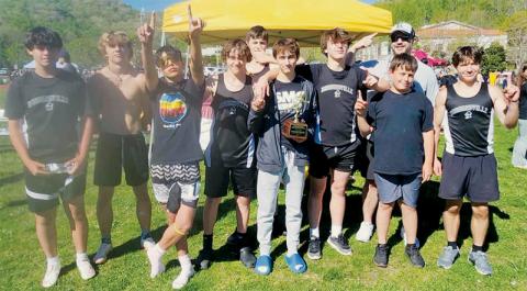 The Robbinsville Middle School Black Knights won the Smoky Mountain Conference track & field championship Monday at Cherokee. From left are Braylon Blevins, Cameron Allison, Xamuel Wachacha, Mason Silvers, Ben Koeller, Eli Lambert, Braydon Lane, head coach Wren Millsaps, Channing Mull and Colton McCoy. Not pictured are Austin Angelo, Ethan Chekeleelee, Kenai Wolfe, Carsan Snider, Kam Woods, Jaxson Blundell, Khayton Swimmer, Braydon Allison and Elijah Kirkland.