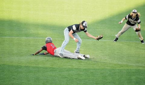 With classmate Bryc Garrison backing him up, Graylen Orr watches Thomasville sophomore Mkyel Duncan slide underneath for an attempted stolen base during the first round of the playoffs May 8. Both teams were unaccustomed to playing on an artificial infield, so Duncan overshot the bag and Orr tagged him out moments later. Photos by Kevin Hensley/sports@grahamstar.com